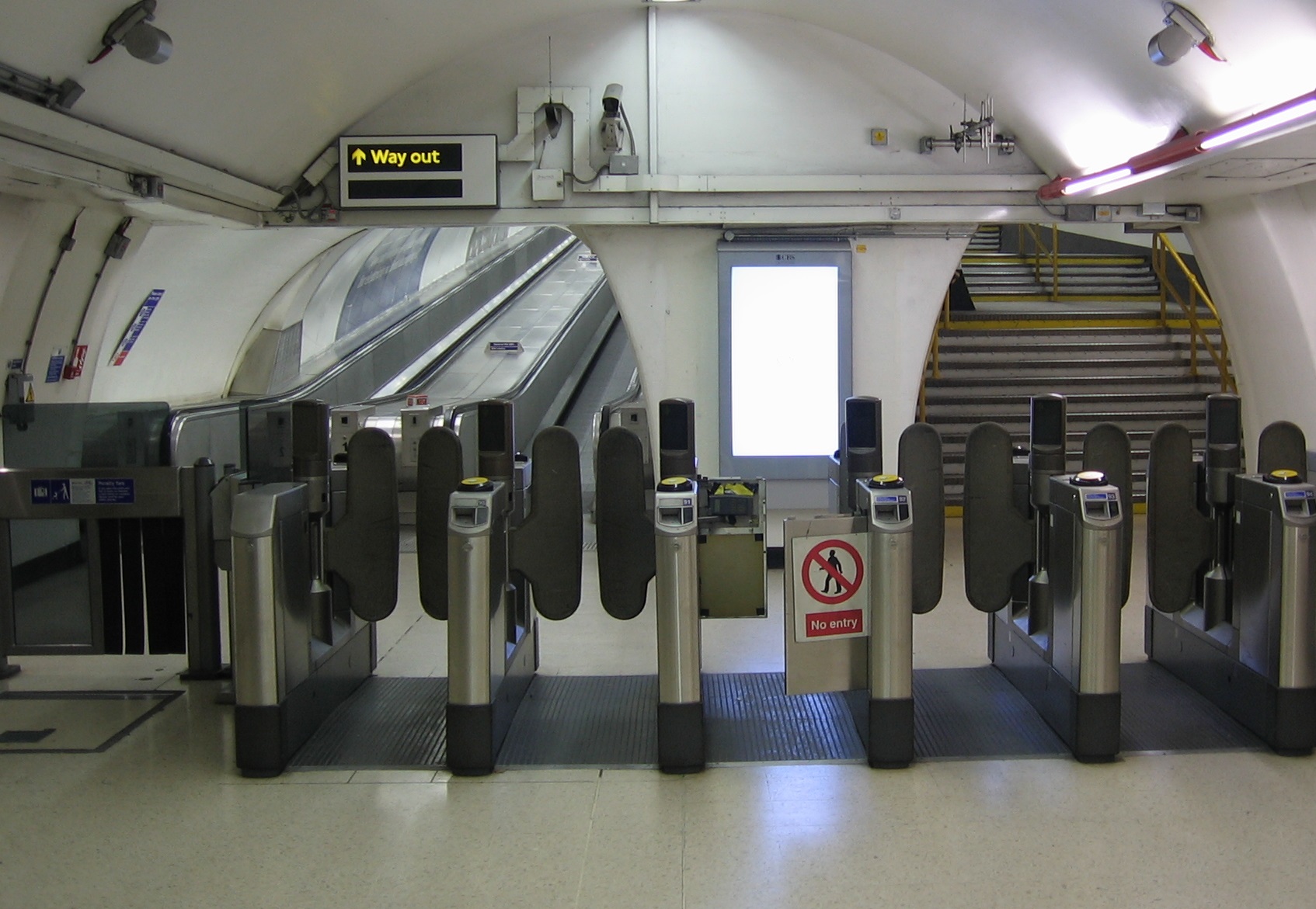 Image of exit from a station to illustrate concept of 'moving on'.